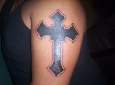 Что означает татуировка в виде перевернутого креста